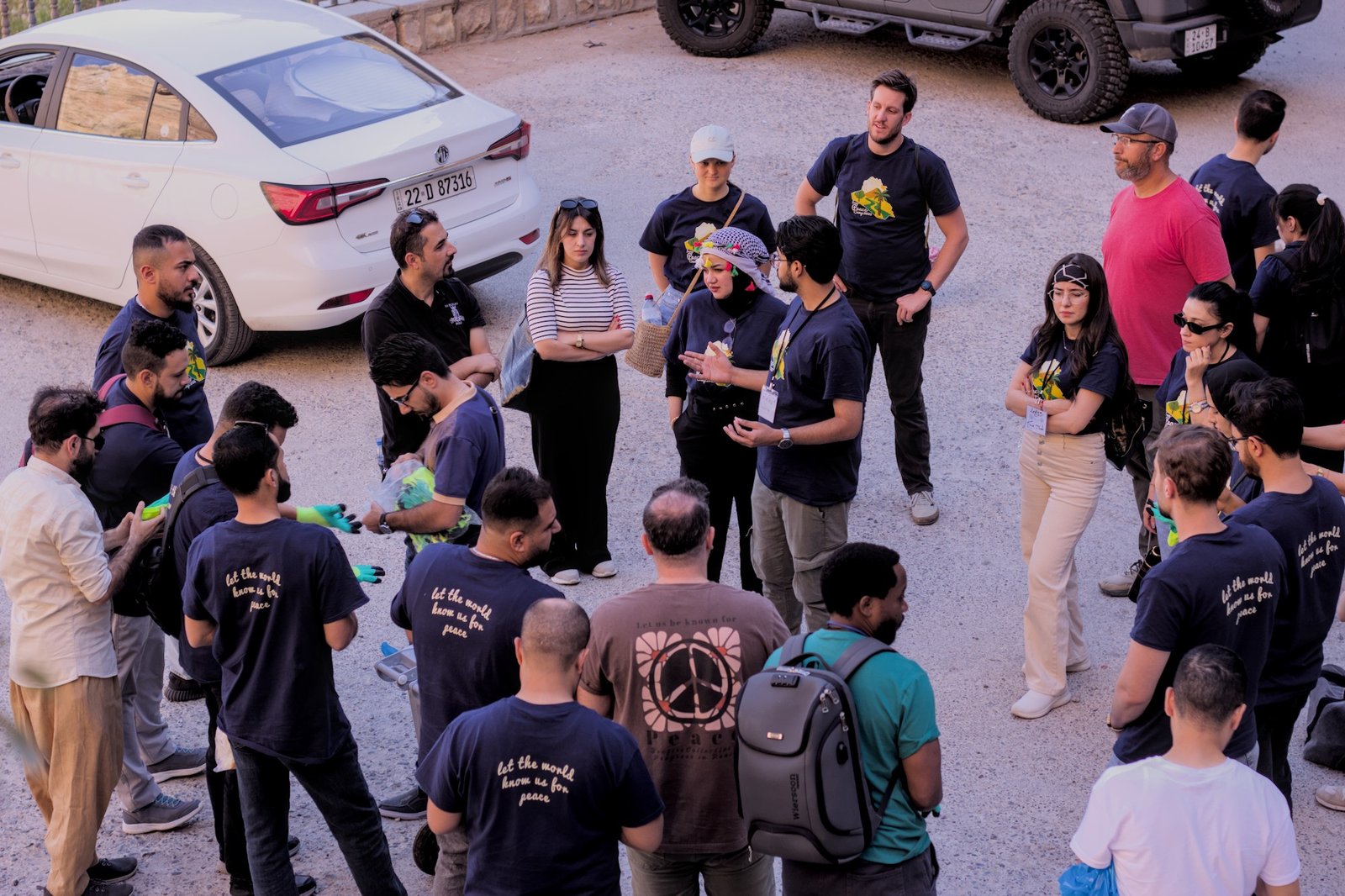 Community members gathered together in a dialogue and storytelling setting